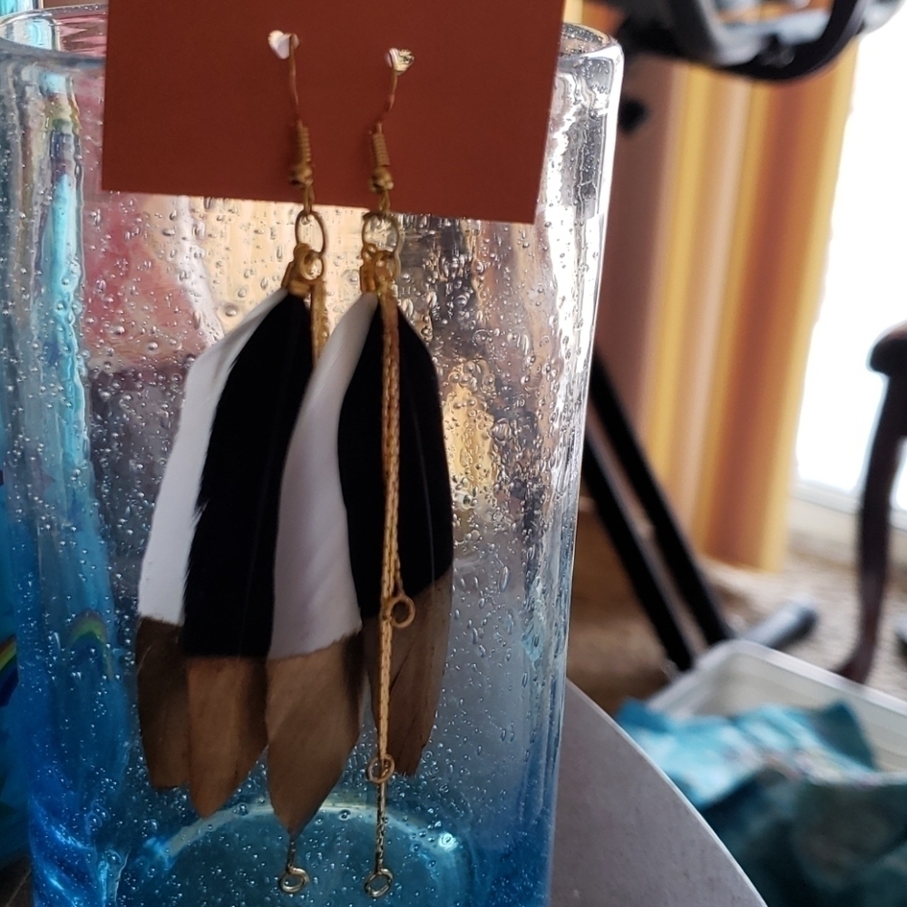 White, black and gold feather earrings. Nwt